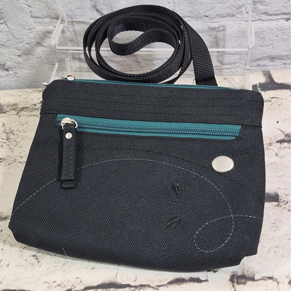 Haiku Impulse Crossbody Bag Black Green Multi-Pocket Travel Purse